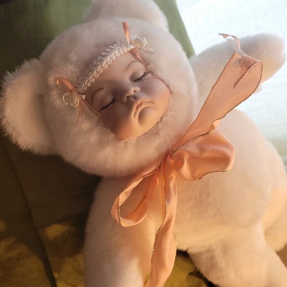 Cute, realistic baby doll in bear suit - Picture 2 of 8